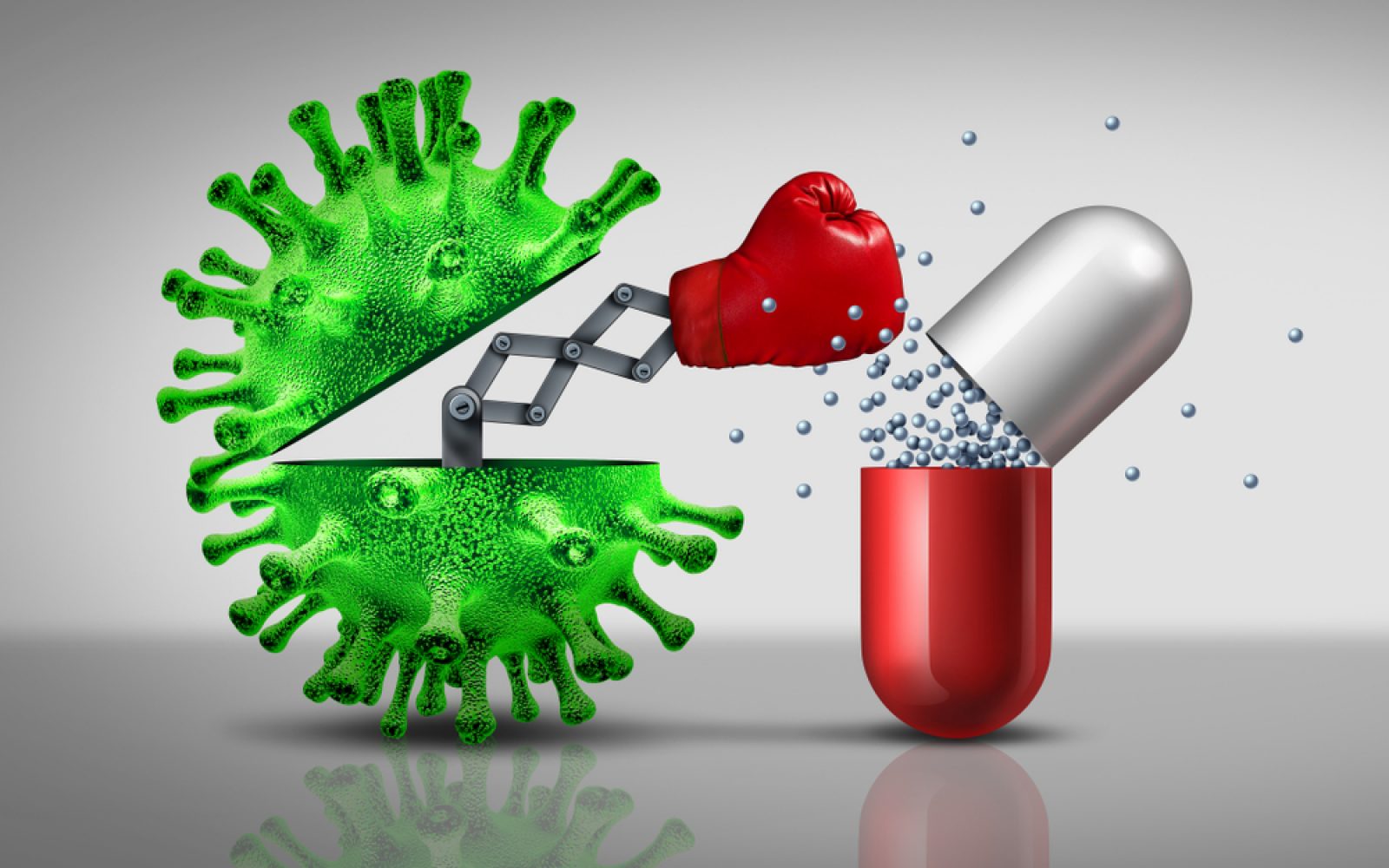 Na sliki je umetniška upodobitev boja med virusom in zdravilom. Zelena virusna celica je prikazana kot kovinska škatla z robotsko roko, ki nosi rdečo boksarsko rokavico in udarja proti kapsuli zdravila. Iz kapsule izhajajo majhne modre kroglice, kar ponazarja sproščanje zdravilnih učinkovin. Ozadje je sivo in preprosto, kar poudarja osrednji motiv boja med virusom in zdravilom.